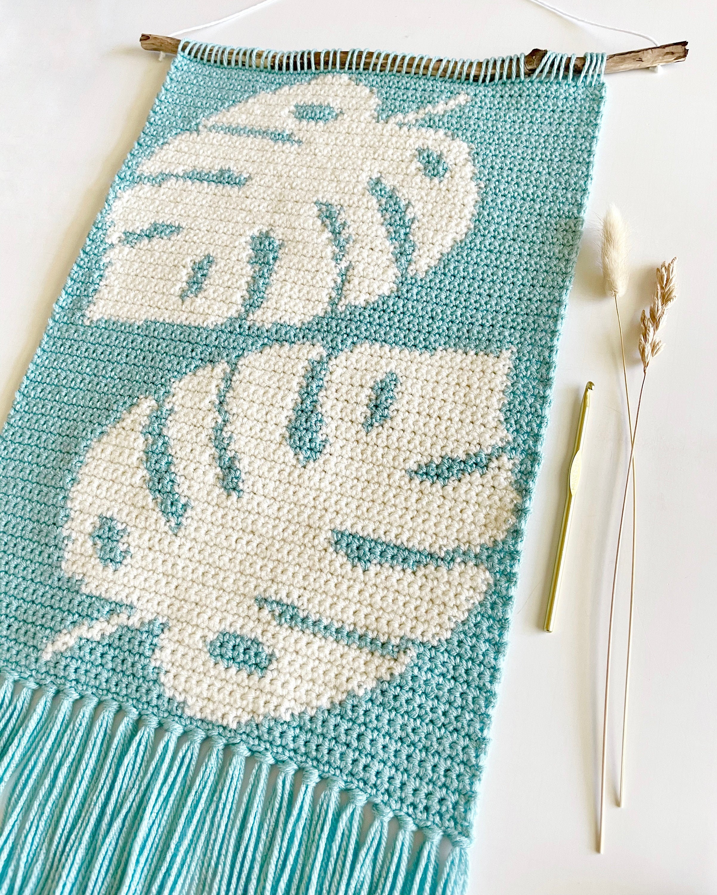 32 Monstera Crochet Patterns for Tropical Leaves, Wall Hangings, and Potted Plants 9 Monstera Leaf Crochet Wall Hanging Pattern