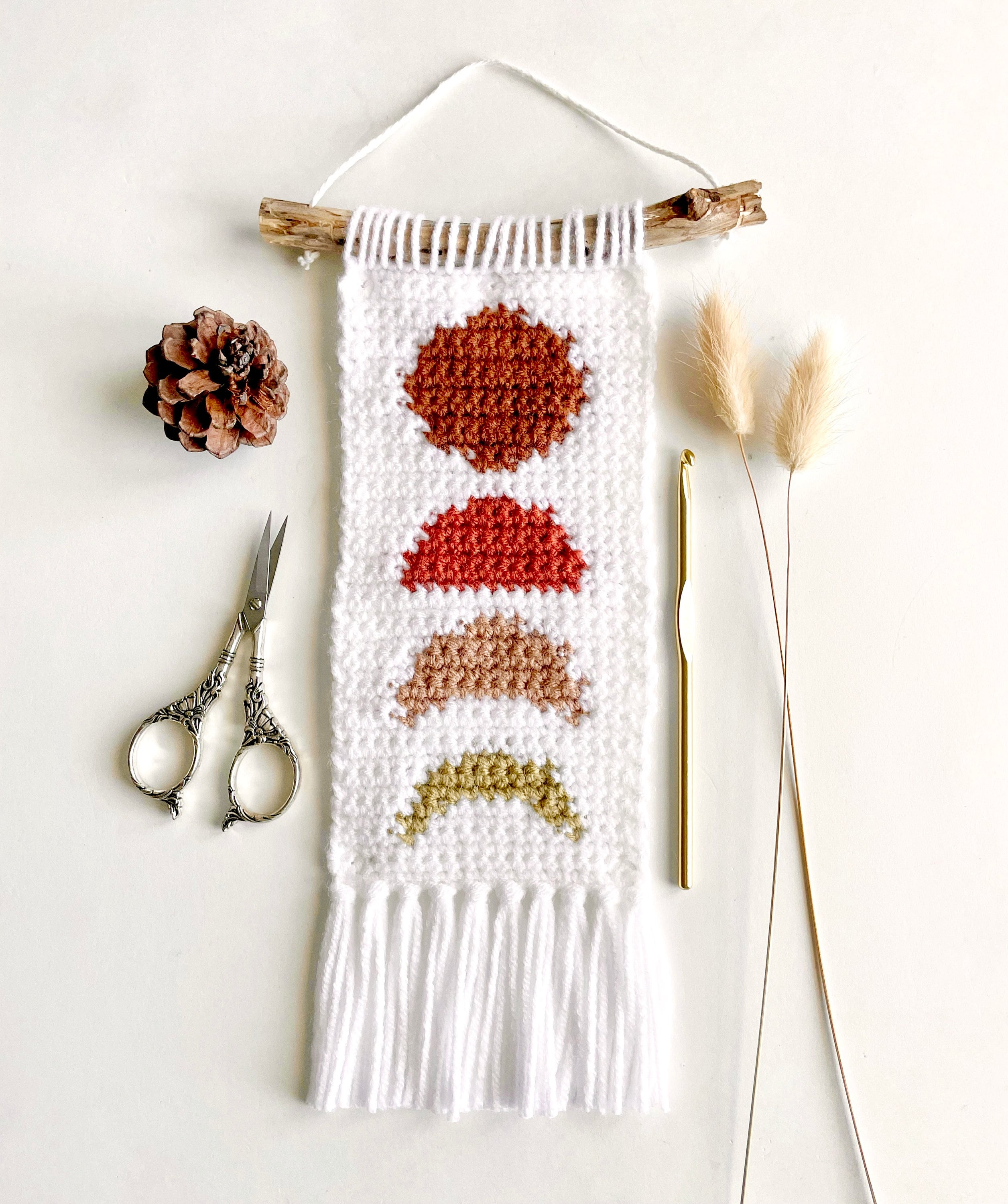 31 Framed Crochet Wall Art Patterns for Stylish, Handmade Decor 16 Crochet Pattern The Teeny Weanie Moon Phase Wall Hanging