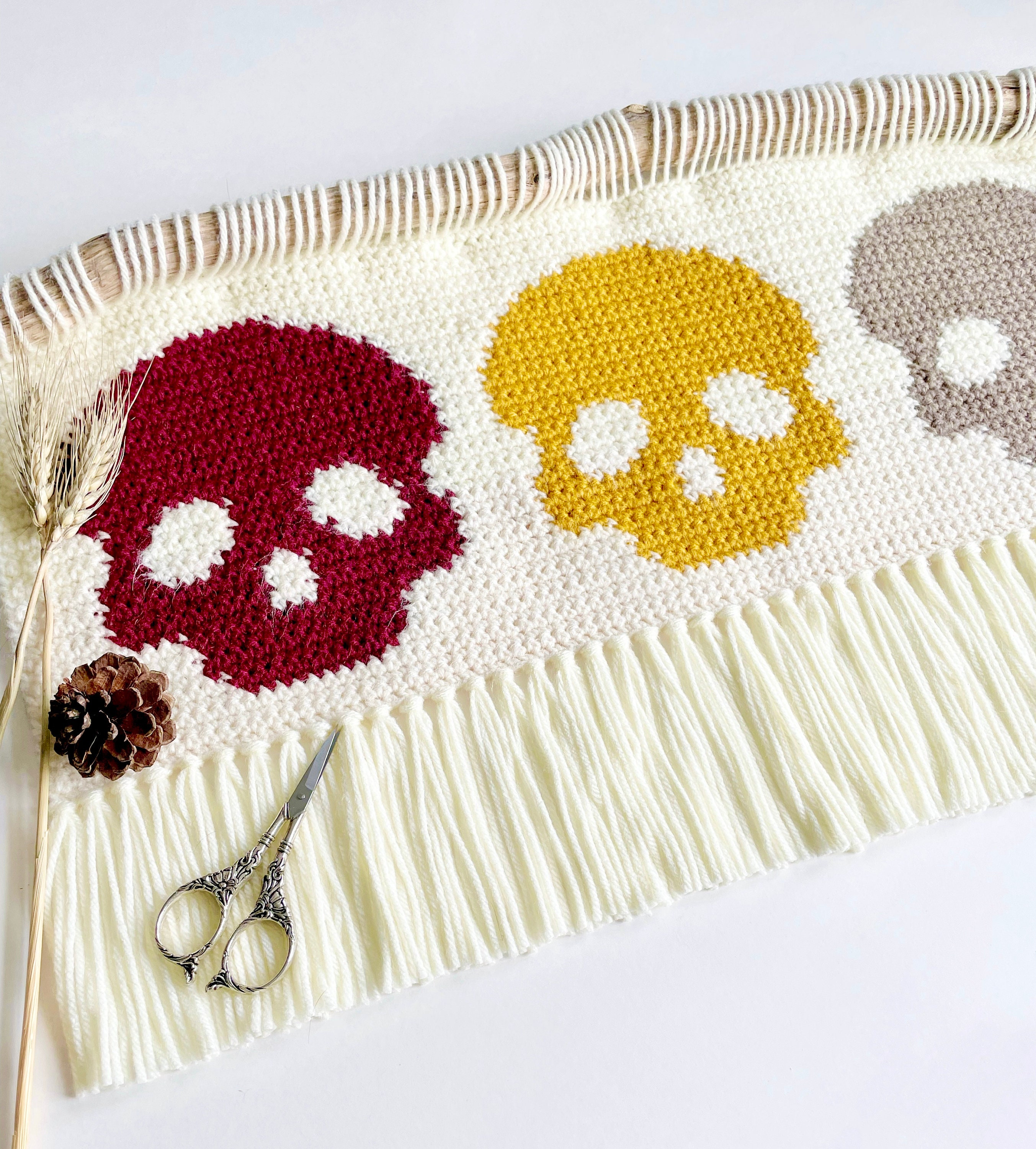 39 Skull Crochet Patterns for Halloween, Gothic Decor, and Creepy-Cute Gifts 35 Crochet Pattern The Skull Trio Wall Hanging Crochet Wall