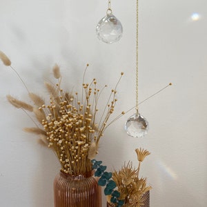 Sun catcher on a gold chain, window ornament, prism rainbow maker, window jewelry