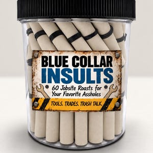 May include: A clear plastic jar with a black ribbed lid containing numerous rolled-up beige paper scrolls secured with black rubber bands. A rectangular label on the front reads: BLUE COLLAR INSULTS 60 Jobsite Roasts for Your Favorite Assholes TOOLS. TRADES. TRASH TALK.