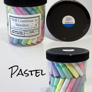 May include: A clear plastic jar with a black screw-top lid filled with rolled pastel-colored paper slips. The label reads "Will Continue to Monitor..." and "Sedate It." with a stethoscope icon. The lid features a circular sticker with a stethoscope logo.