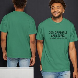 May include: A green short-sleeved t-shirt featuring the black text 70% OF PEOPLE ARE STUPID. I'm obviously with the other 40%. The shirt is shown from both the front and back views, displaying a plain green back and a graphic front.