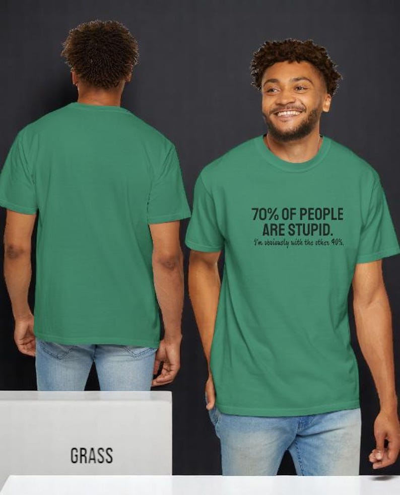 May include: A green short-sleeved t-shirt featuring the black text 70% OF PEOPLE ARE STUPID. I'm obviously with the other 40%. The shirt is shown from both the front and back views, displaying a plain green back and a graphic front.
