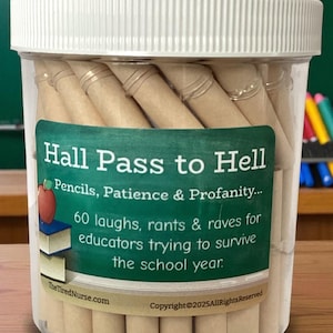 May include: A clear plastic jar with a white lid filled with rolled paper scrolls. A green label reads "Hall Pass to Hell" with text about educators. The jar is on a wooden surface, with a blurred background of a chalkboard and colored pencils.