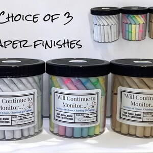 May include: Three clear plastic jars with black lids, each filled with rolled paper scrolls. The labels read "Will Continue to Monitor..." and "60 Days of Chaos, Charting & Coping." The paper finishes are white, pastel-colored, and kraft brown.