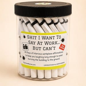 May include: A clear plastic jar with a black lid containing rolled white paper slips secured with black rubber bands. The label reads: SHIT I WANT TO SAY AT WORK... BUT CAN'T. 60 Days of hilarious workplace affirmations to keep you laughing.
