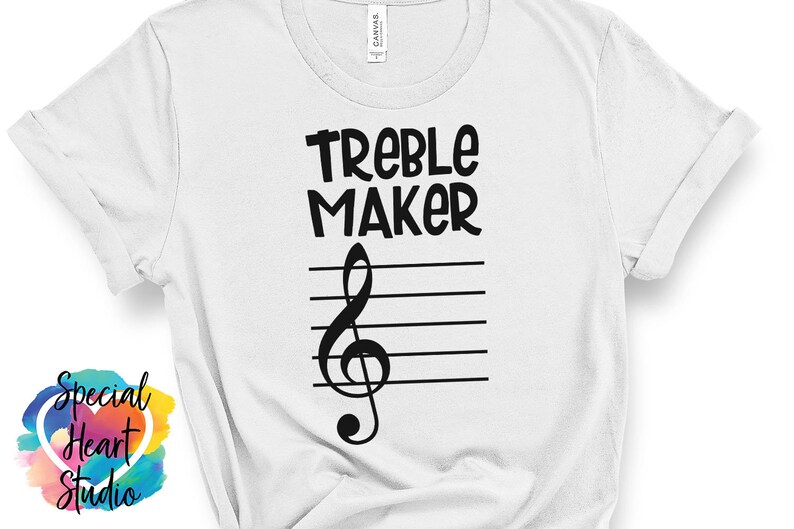 May include: White t-shirt with black text that reads "Treble Maker" and a treble clef symbol on a musical staff.