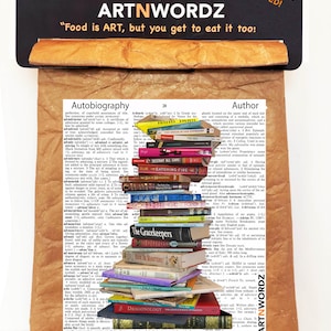 May include: A brown paper lunch bag with a black header that reads "TYVEK LUNCH BAG by ARTNWORDZ" and "REUSABLE & INSULATED!"  The bag has a quote that reads "Food is ART, but you get to eat it too!"  The bag is filled with a stack of colorful books, with the titles visible.  The books are stacked in a pyramid shape.