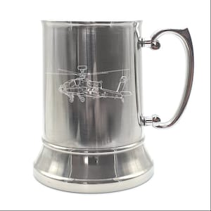 May include: A stainless steel beer stein with a silver handle and a laser-etched design of a helicopter.