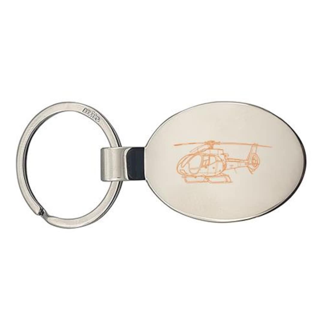 Porte clé de collection Lubrifiants ELF en très bel état