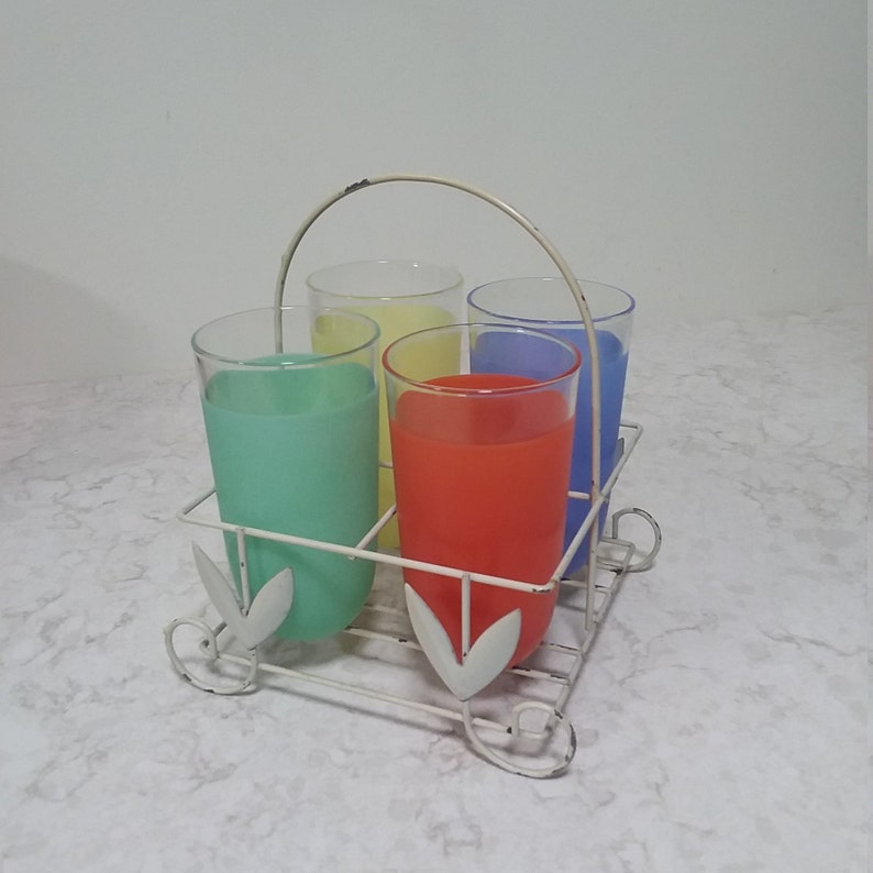 Classic 1940s kitchen. Rare vintage multi-colored glassware with handy metal carrier