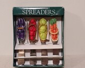 Whimsical cheese or dip spreaders. Set of four, 1999. Like-new condition.