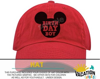 May include: Red baseball cap with a black Mickey Mouse ears design and the text "BIRTH DAY BOY" in red letters.