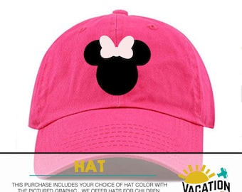 May include: Pink baseball cap with a black and white Mickey Mouse silhouette and a pink bow. The text "HAT" is on the front of the cap. The text "VACATION VIBES" is on the bottom of the image.