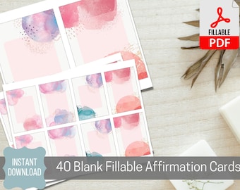 May include: 40 blank fillable affirmation cards with watercolor backgrounds in shades of pink, blue, and purple. The cards are designed for writing positive affirmations and are perfect for self-reflection and personal growth.