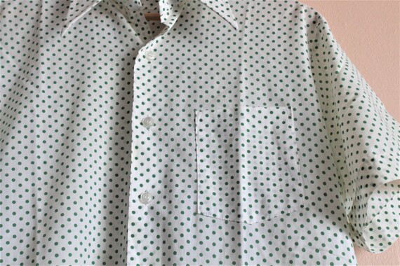 white polka dot button down shirt