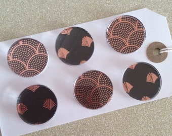 May include: Six round, black and copper, decorative stickers with a geometric pattern. The stickers are arranged in two rows of three on a white background.