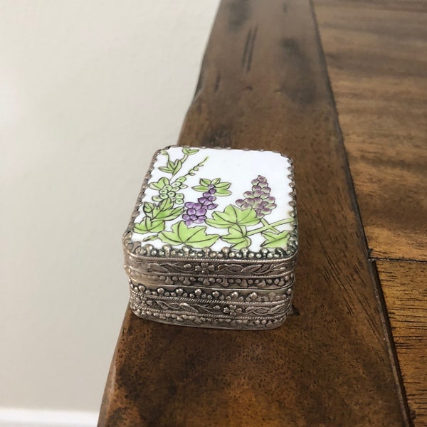 Silver trinket box with hand painted porcelain floral top and interior mirror