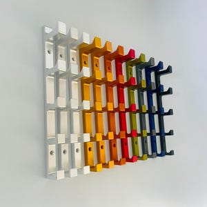 Gancho de pared vertical 5 en 1, resistente, moderno y decorativo, para colgar en la pared.