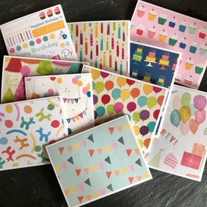 May include: A collection of colorful birthday cards with various patterns, including balloons, candles, and party hats. The cards feature the text "Happy Birthday", "Happiest Birthday", "Celebrate", and "Party!"
