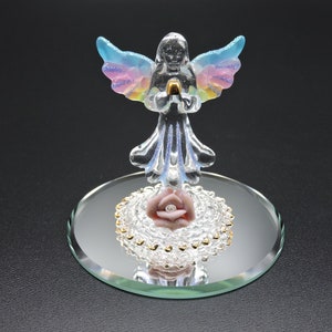 Ángel flotante de vidrio hecho a mano