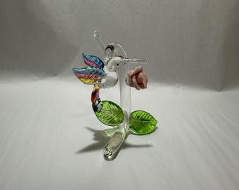 Handmade Glass Mini Rose Hummingbird a Pink Glitter covered Porcelain Flower.