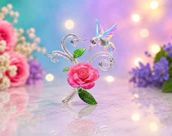 Hand Made Glass Hummingbird with a Pink Glitter covered Porcelain Flower.