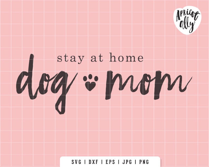 May include: Pink background with a grid pattern and the words "stay at home dog mom" in a dark gray script font. A paw print heart symbol is between "dog" and "mom". The Apricot Ally logo is in the upper right corner.