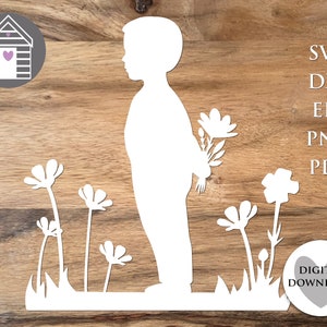 May include: A white silhouette of a person holding a bouquet of flowers, standing in a field of flowers. The background is a wood grain texture.