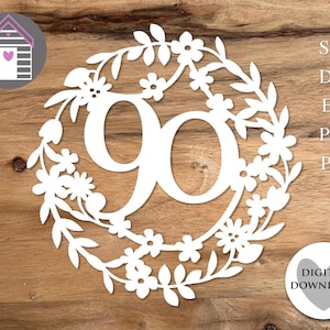 May include: White floral wreath with the number 90 in the center, perfect for a 90th birthday celebration. The design includes leaves and flowers. The image also includes the text "SVG, DXF, EPS, PNG, PDF" and "DIGITAL DOWNLOAD".