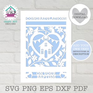 May include: A white laser-cut baptism card with a light blue background. The card features the words "CONGRATULATIONS" and "ON YOUR BAPTISM". A heart-shaped design includes a church, flowers, and doves. The card is a digital download.