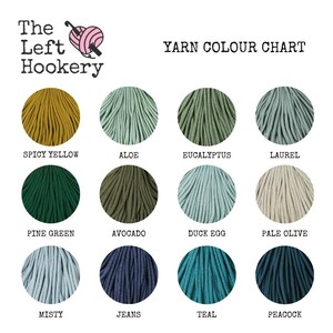 May include: A yarn color chart from The Left Hookery, featuring twelve yarn colors. Colors include Spicy Yellow, Aloe, Eucalyptus, Laurel, Pine Green, Avocado, Duck Egg, Pale Olive, Misty, Jeans, Teal, and Peacock. The chart is designed for crafting projects.