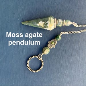 Moss agate pendulum with hamsa and ring charm