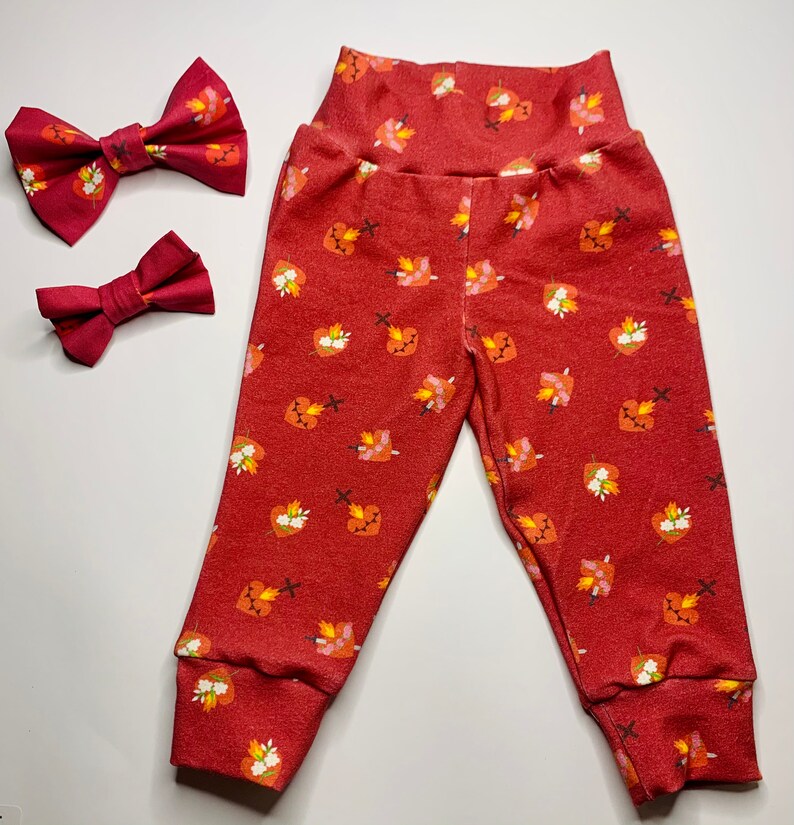 Red Shining Light Dolls Print Holy Family Heart Pants