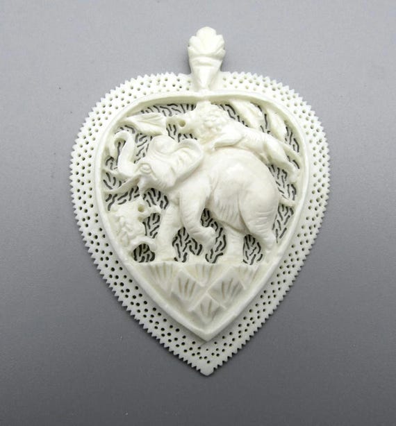 Intricately Carved Elephant Pendant Charm with Lion and Bird