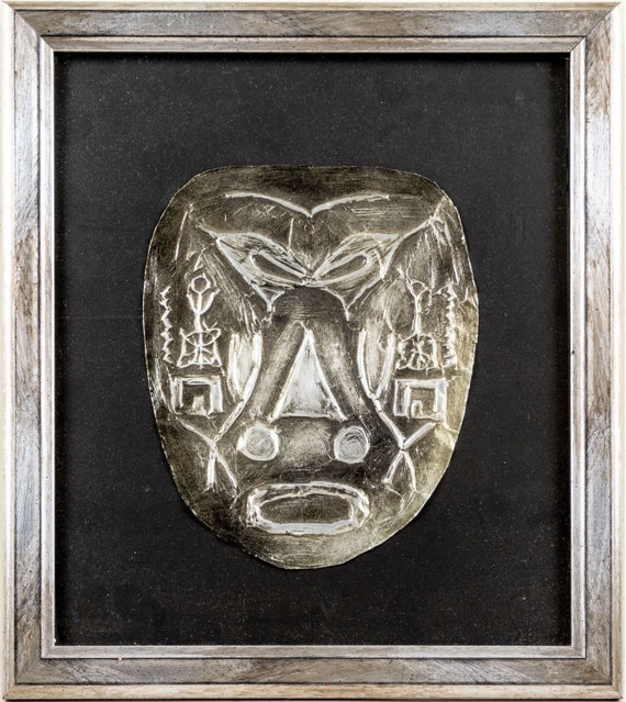 Metal Mask Art with Tribal Symbols Framed Under Glass