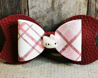 Plaid print faux leather bow