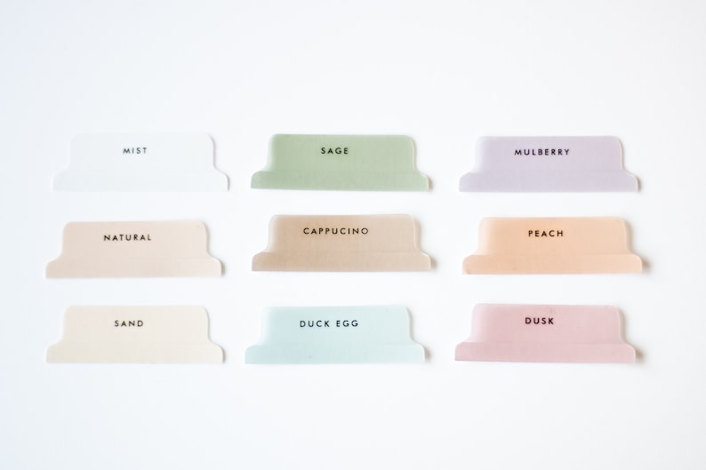 May include: Nine different coloured file folder tabs with the names "Mist", "Sage", "Mulberry", "Natural", "Cappuccino", "Peach", "Sand", "Duck Egg", and "Dusk" printed on them.
