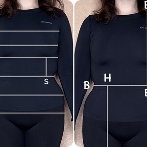 May include: Two images side-by-side showing a person wearing a long-sleeved navy blue top and black leggings. White lines and letters (A, B, C, E, F, G, H, S, U) are overlaid on the images, likely for measurement purposes. The text "AMI MEDIA" is visible on the top.