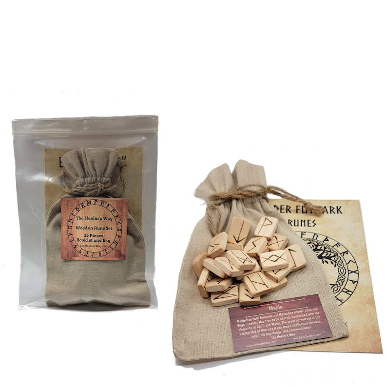 May include: A set of 25 wooden runes in a burlap bag with a booklet and a small bag. The runes are inscribed with the Elder Futhark runes. The booklet is titled "The Healer's Way" and has a maple leaf design.