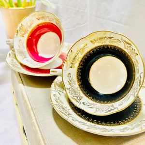 Vintage Teacup and Saucer Tokyo China, set of (2) teacups and saucers, pink and black with gold overlay of roses on white ground,