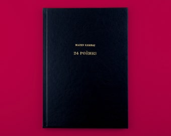 May include: A black leather-bound book with gold lettering on the cover. The title is "Mazen Kerbaj 24 Poemes".