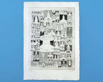 May include: Black and white print of a series of abstract faces, each with unique features. The print is framed in a white mat and has the number "6/150" and "AP 2/25" printed in the bottom corners.
