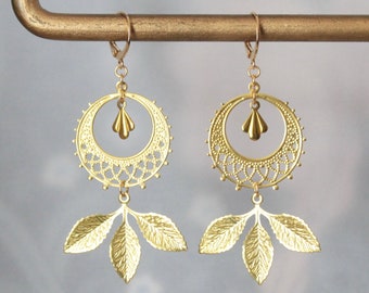 Boucles d'oreilles dorées mystiques rondes feuilles