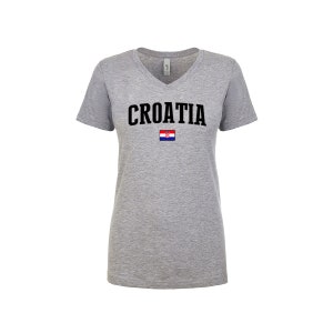 May include: A heather gray V-neck t-shirt with the word "CROATIA" printed in black on the front. The Croatian flag is printed below the word.
