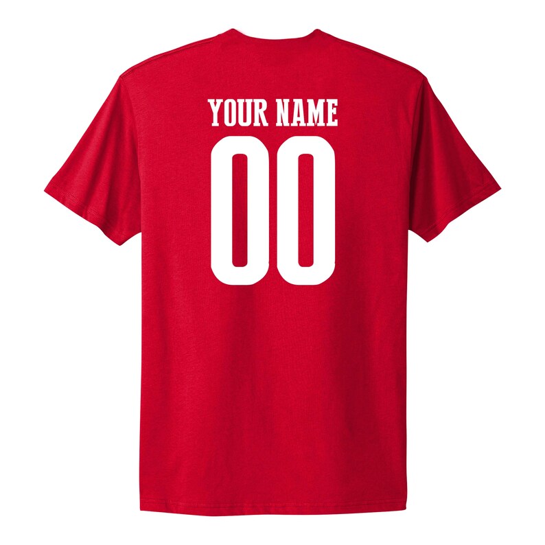 May include: Red t-shirt with white text that says "YOUR NAME" and the number "00" on the back.