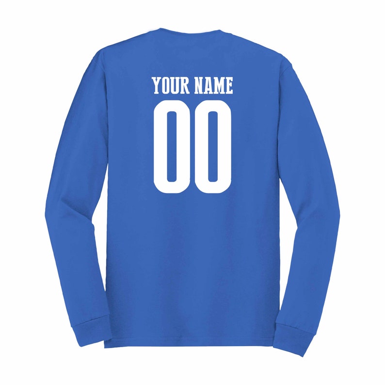 May include: A royal blue long-sleeved t-shirt with "YOUR NAME" and the number "00" printed on the back in white.