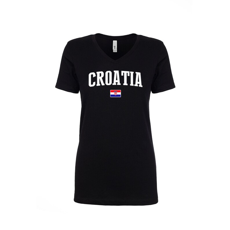 May include: Black v-neck t-shirt with the word "CROATIA" in white letters and the Croatian flag printed on the front.