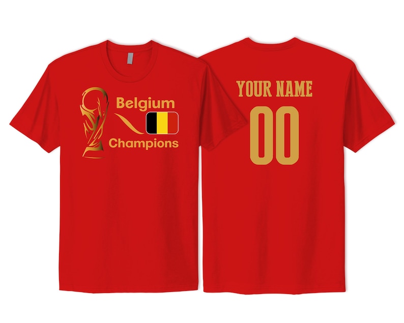 May include: A red short-sleeved t-shirt featuring a gold trophy graphic, the text Belgium Champions, and the Belgian flag on the front. The back displays the text YOUR NAME above the number 00 in a large gold font, centered on the fabric.